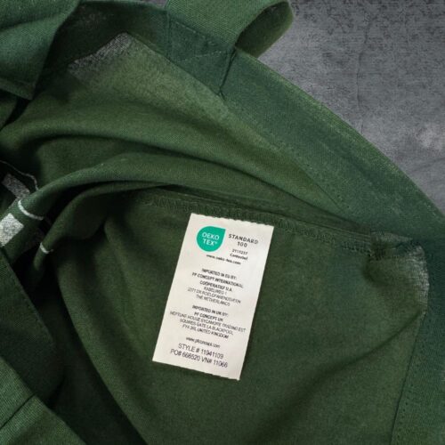 Close-up of the green TARIGS fabric bag showing the Oeko-Tex certificate (label) inside the bag.